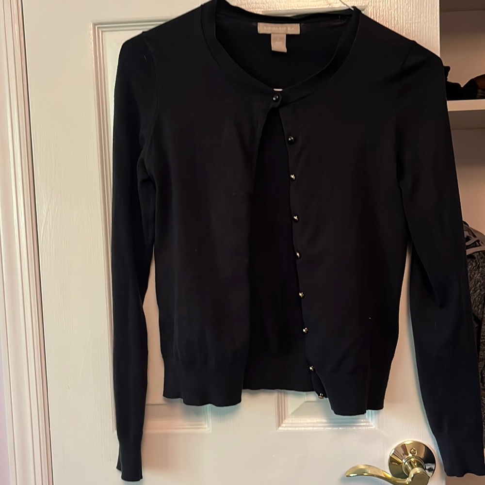 Black cardigan with gold and black button details